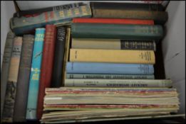 A collection of vintage books on aircraft and the