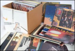 A collection of vinyl long pay LP records to include many artists such as Eddie Cochran, The Eagles,