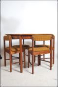 A 1960's retro 20th century Macintosh of Kirkcaldy teak dining suite comprising extending dining