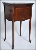 An Edwardian mahogany inlaid sewing box / ladies w