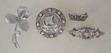 A collection of 4 silver ladies brooches to include Viking shield, forget me not brooch with 9ct