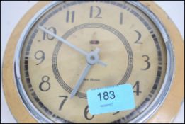 A vintage 20th century New Haven electric wall clock, made in the USA.