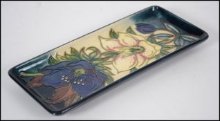 A contemporary Moorcroft pen tray in the Hellebore
