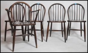 A set of 6 Ercol mid century dining chairs of dark