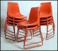A set of retro Robin Day style stacking chairs hav