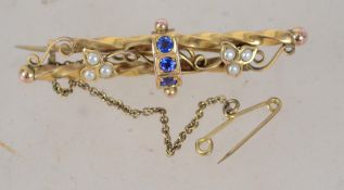 An Edwardian 9ct gold blue stone and pearl brooch
