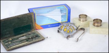 A mixed lot to include silver hallmarked napkin ri