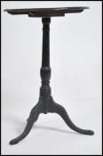 A 19th century Georgian scrumble finished tripod w