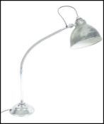 A vintage mid century retro industrial work lamp.  This goose neck light has a heavy metal