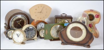 A collection of vintage mid century clocks to incl