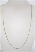 A 9ct gold chain necklace marked 9K tests 9ct gold.  Total weight 5.1g. Measures 22 inches.