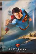 A extremely large cinema lobby advertising  poster for Superman ' Superman Returns '
