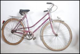 A pair of vintage 20th century ladies push bikes to include an Rudge Ulster Sport along with a