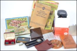 A collection of items to include a vintage Fry's chocolate box, gents cuff links, cigarette Bakelite