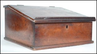 A 19th century Victorian mahogany Clerks table top writing slope having a hinged top revealing a