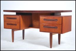 A 1970's G-Plan teak wood dressing table in the ma