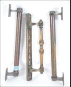 A pair of stunning copper door handles of architec