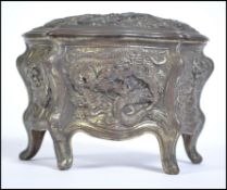 A 19th century Chinese silvered bronze serpentine