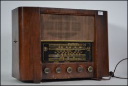 A 1930's walnut cased radiogram of large form havi