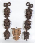 A carved Black Forest wall bracket in the form of