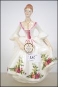 A Royal Doulton figurine entitled  'Country Rose'