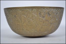 An early 20th century Chinese brass bowl with heav