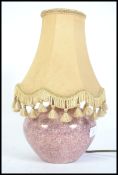 A 1930's lustre ceramic table lamp of bulbous form