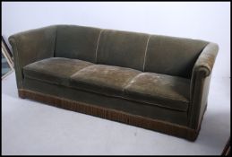 A large early 20th century knoll style sofa settee