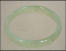 A 20th century Chinese ladies Jade bangle of round
