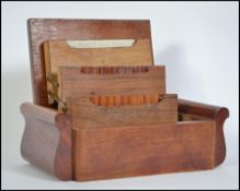 An early 20th century inlaid cigarette case of tab