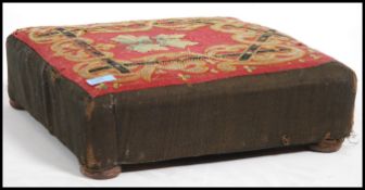 An early 20th century foot stool of square form ha