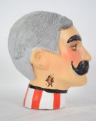 A large shop display - haberdashery shop bust being studio handmade and painted in plaster of a