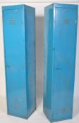 A pair of mid century Industrial metal blue lockers of upright form having good twist handles with