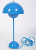 A contemporary flowerpot desk lamp in blue by Louis Poulsen for Verner Panton. Domed half spheres in