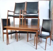 A 1960's Danish teak dining table and chairs believed to be by Arne Hovmand Olsen for Mogens Kold.