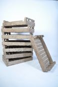 A set of 8 vintage industrial mid century apple crates - stacking. Wooden slatted construction.