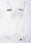 After Greta Grossman, a fabulous pair of large white grasshopper floor lamps. Having a tubular steel