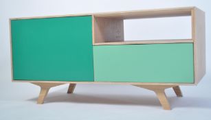 A fabulous Scandinavian inspired modernist Live Iconic Oskar low sideboard cabinet. Two tone colours