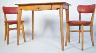 A vintage mid 20th century Beech wood  kitchen dining table with a red Formica top and drawer to one