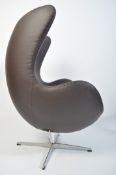 A fabulous Arne Jacobsen for Fritz Hansen style dark brown leather upholstered Egg chair - armchair.