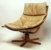 A scandinavian leather and bentwood ' falcon ' style  armchair by Stouby. Raised on multiple splayed