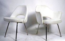 After Eero Saarinen, a near pair of white  faux leather and chrome upholstered ' executive ' side