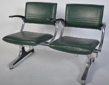 A 1970's retro polished steel twin seat barbers salon waiting chairs - armchairs having green