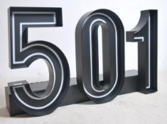 A retro 20th century shop counter / window advertising point of sale illuminated sign for 501.