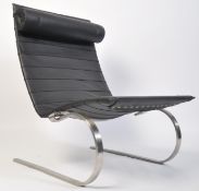 After Poul Kjaerholm, a stunning black leather and polished steel PK20 armchair / chair. Raised on