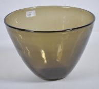 A Bengt Orup for Johansfors smoked glass bowl of deep form circa 1960's signed to the base. Measures
