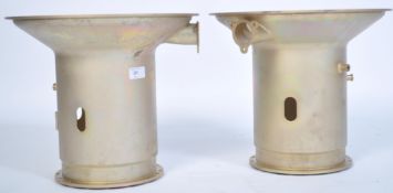 A pair of Industrial brushed steel helicopter engineering parts, each of conical form with gilded