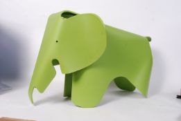 After Charles Eames, a retro style plastic formed elephant in the dark lime colour. Children's stool