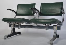 A 1970's retro polished steel twin seat barbers salon waiting chairs - armchairs having green