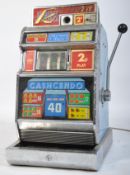An original 1960's Riviera Jubilee ' Cashcendo ' one arm bandit coin operated fruit machine.